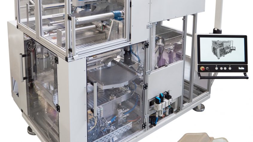 Maszyna typu PLU do laminowania tacek z masy celulozowej - modułowa seria maszyn Illig XLU do pakowania żywności z zastosowaniem zestawu automatyzacji ctrlX AUTOMATION firmy Bosch Rexroth.  (Źródło obrazu ILLIG Maschinenbau GmbH)